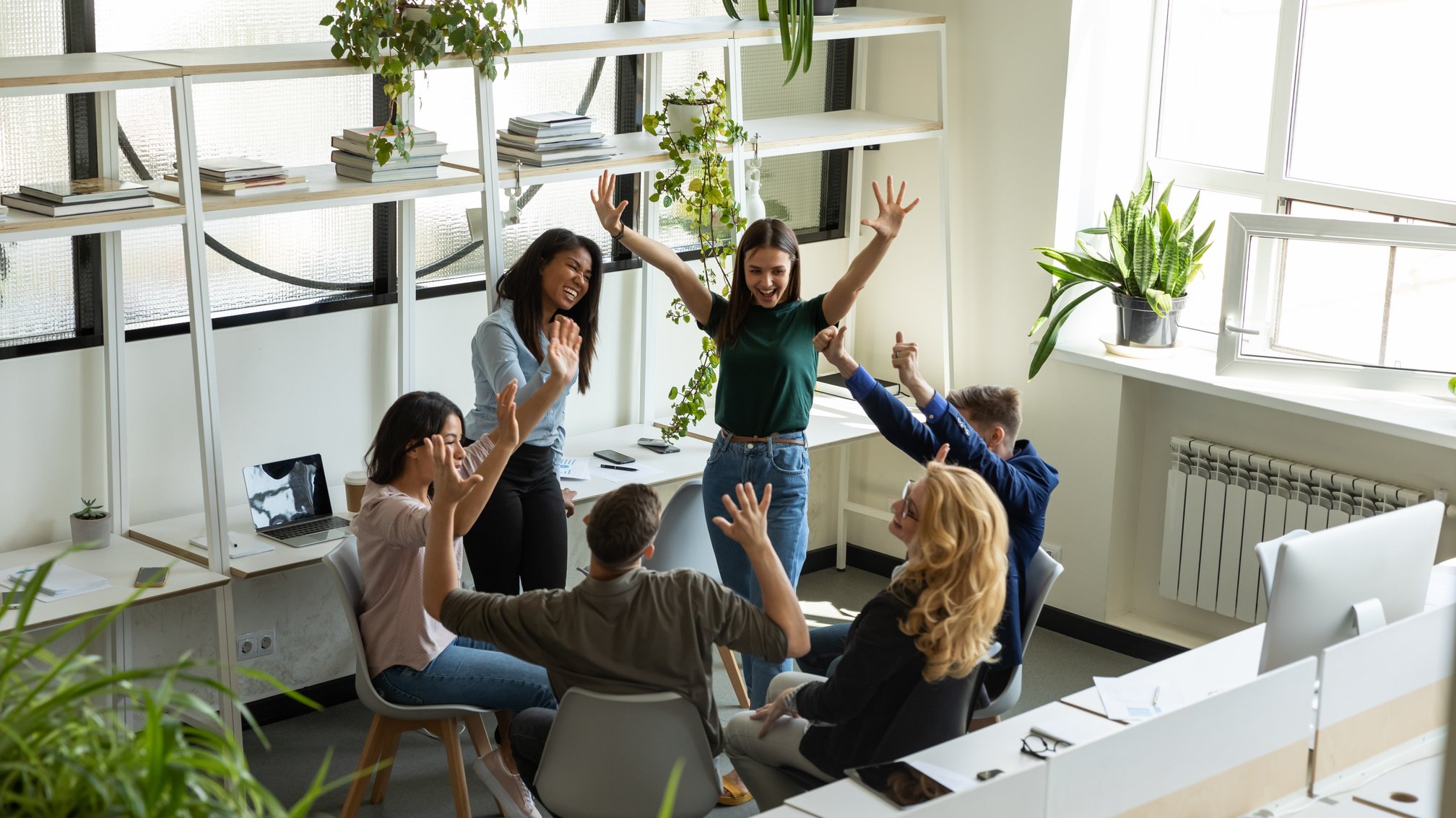 Excited Friends Having Fun Meeting in Office
